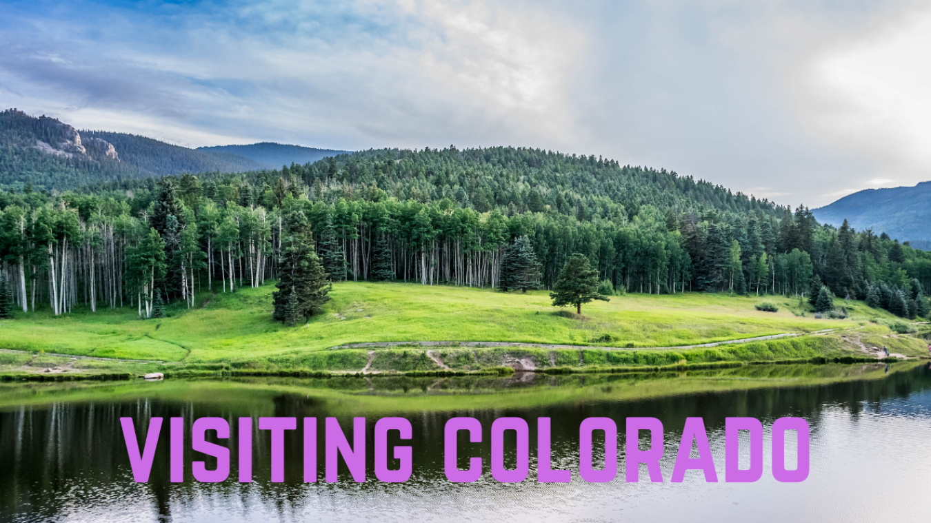 a photo of trees by the water. with the words "visiting Colorado" on it.