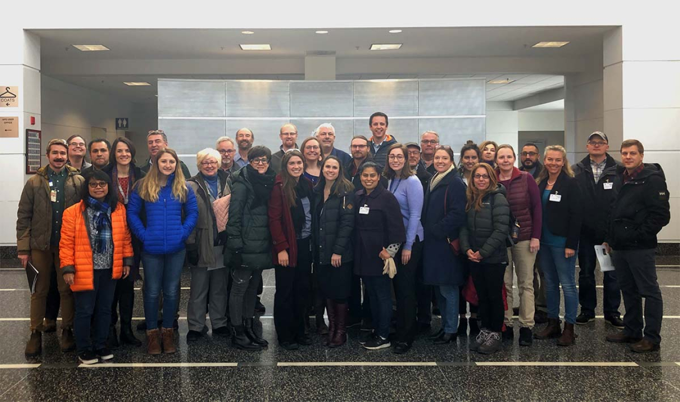 A group photo of workshop attendees.