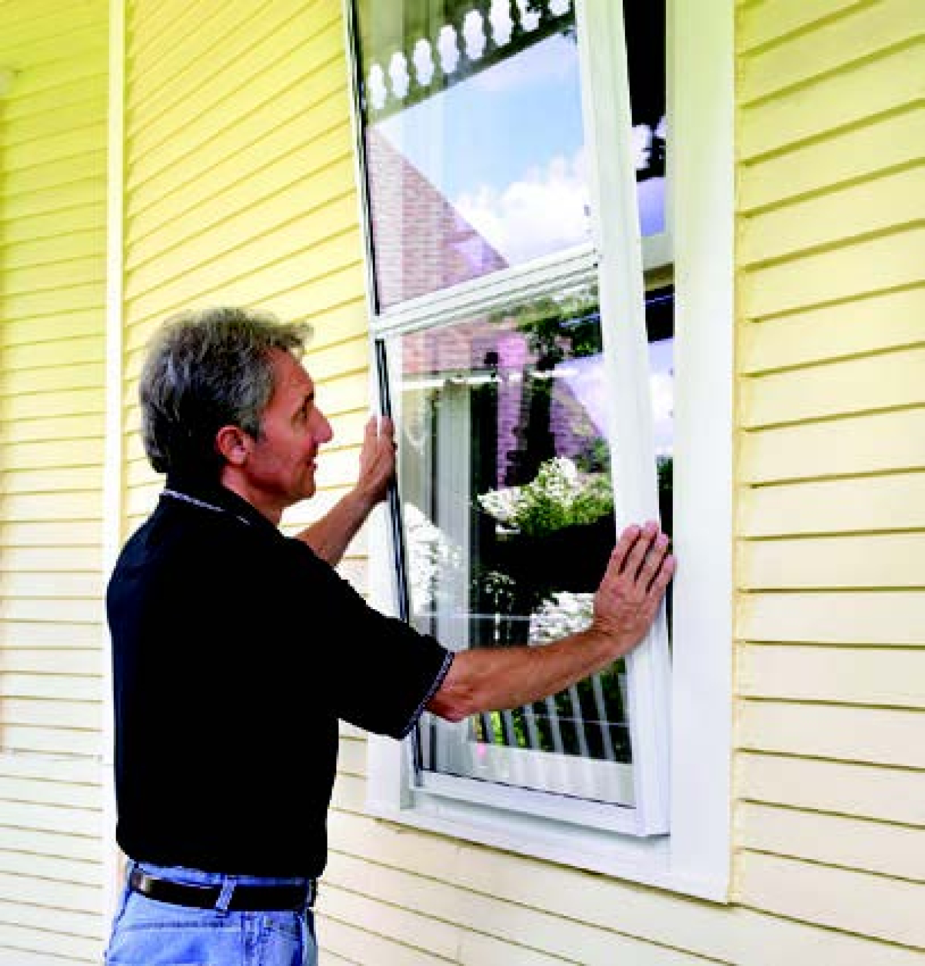 Man setting a window frame.