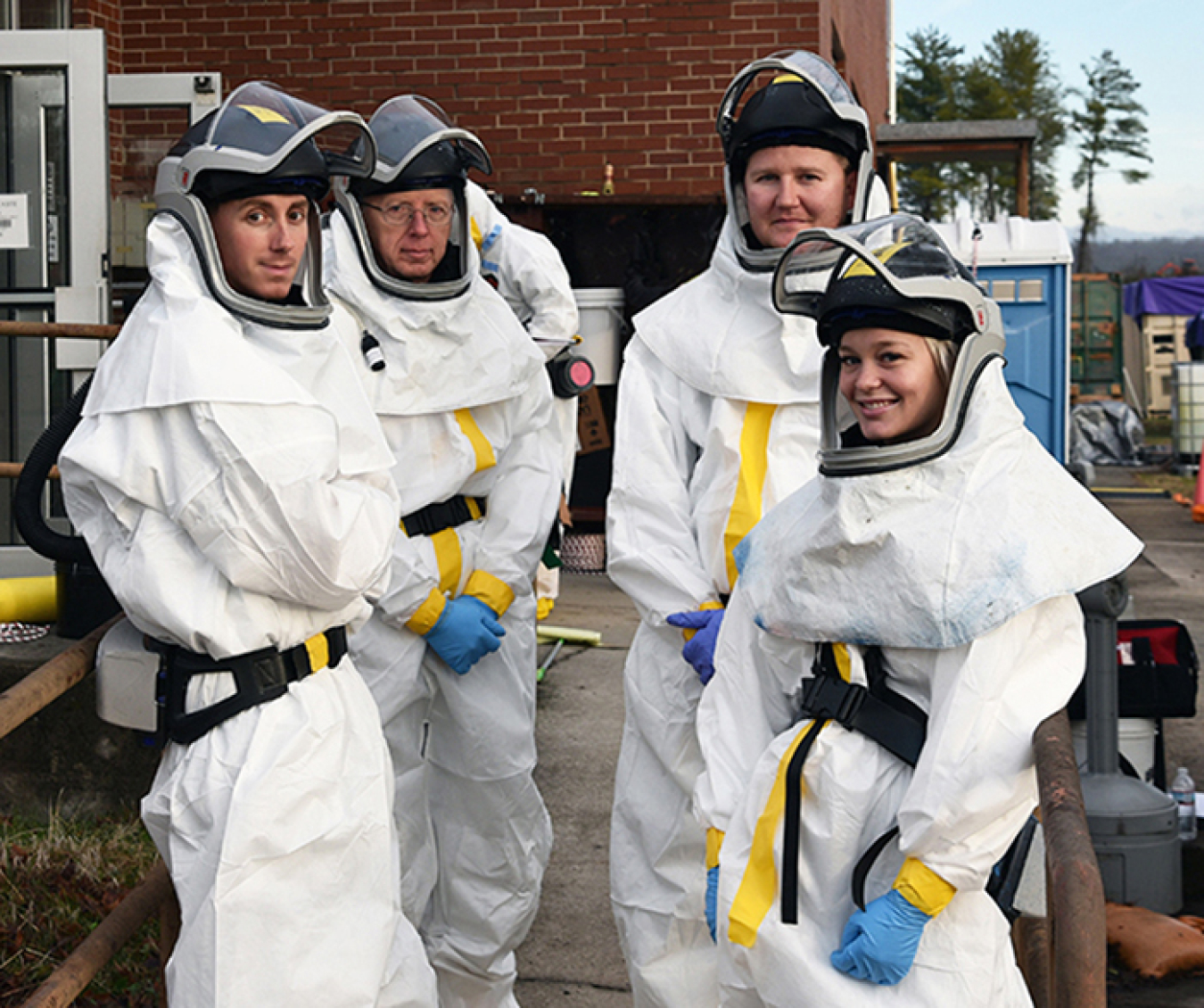 An EM crew gathers before performing deactivation work inside the K-1006 Building to prepare the facility for demolition.