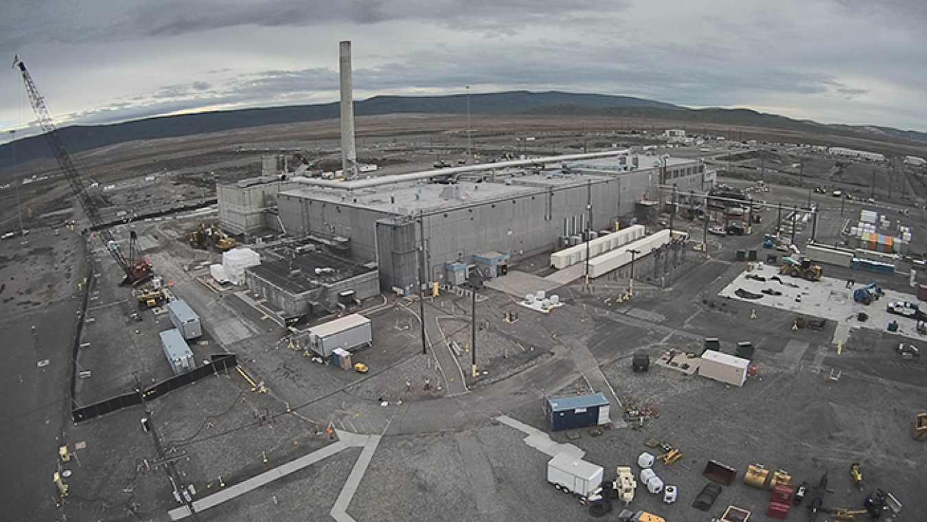 Before and after: Photos of the Plutonium Finishing Plant’s main processing facility at the Hanford Site from November 2016, at top, and after the completion of demolition earlier this month.