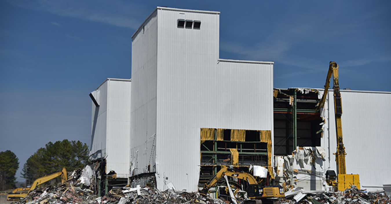 Workers begin taking down the K-1200 section of the Centrifuge Complex at Oak Ridge's East Tennessee Technology Park.