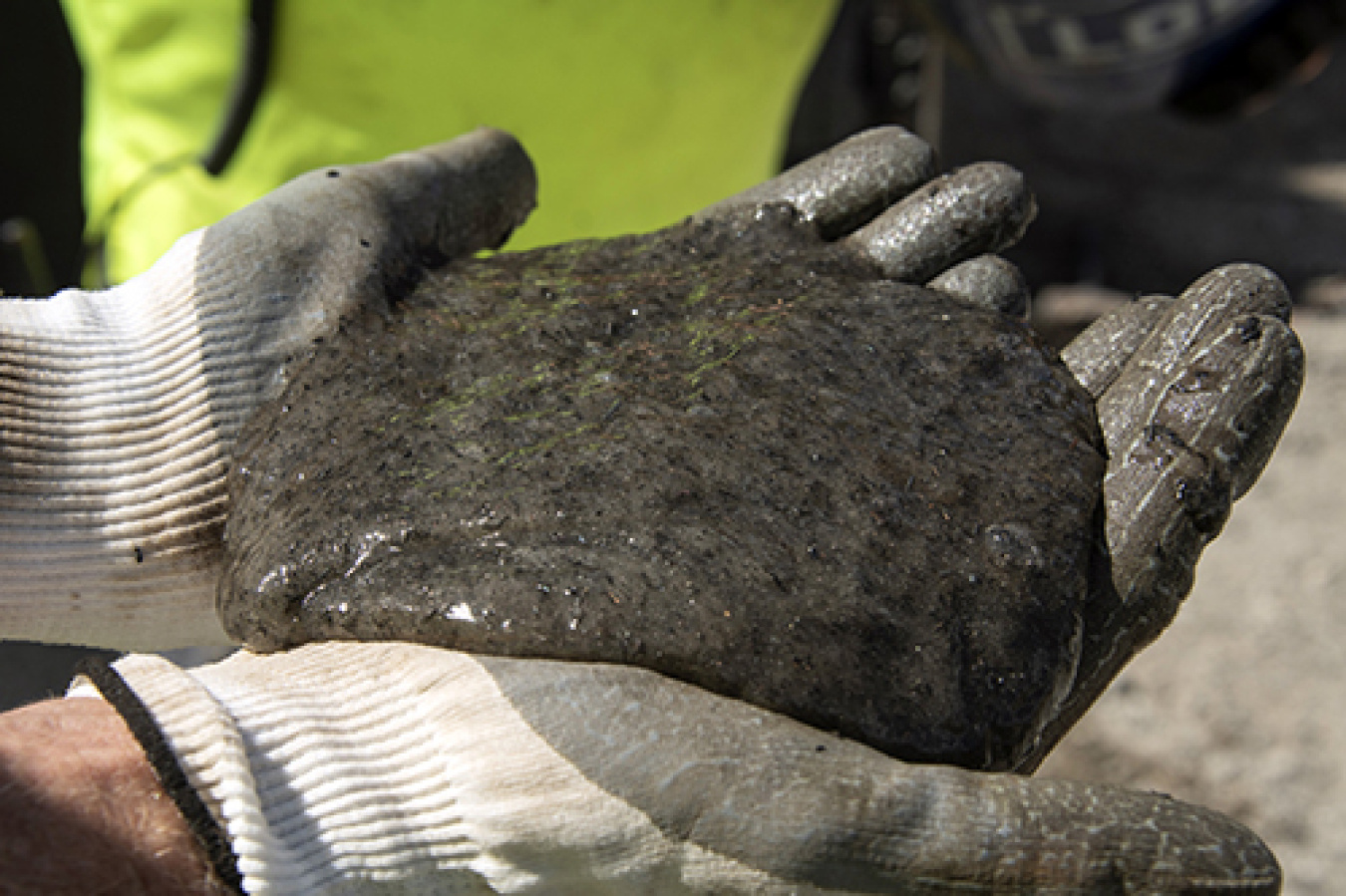 Workers mixed more than a million pounds of iron filings with a food-grade, starch-like material, shown here.