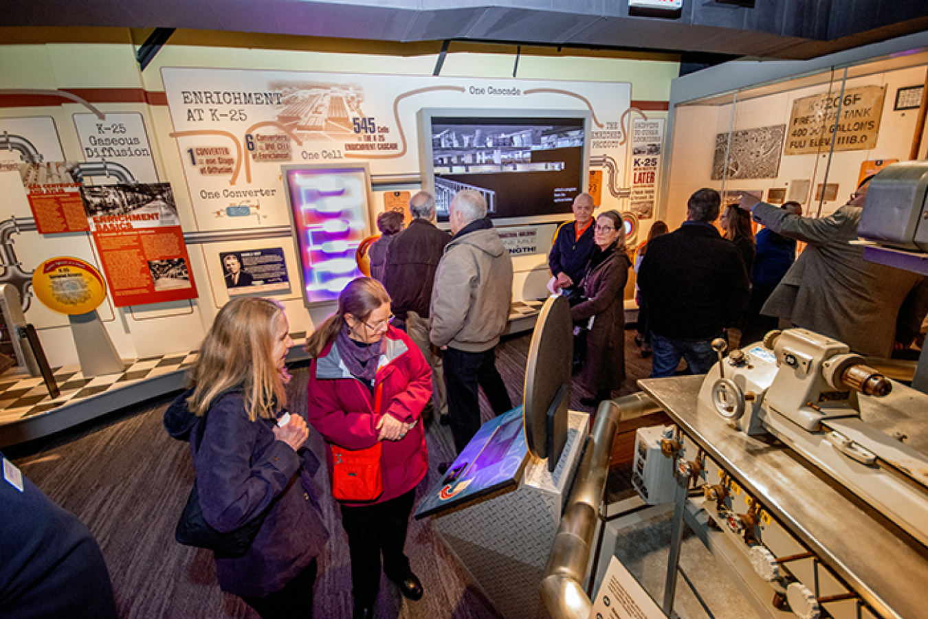 Visitors explore the many exhibits and interactive displays in the K-25 History Center.