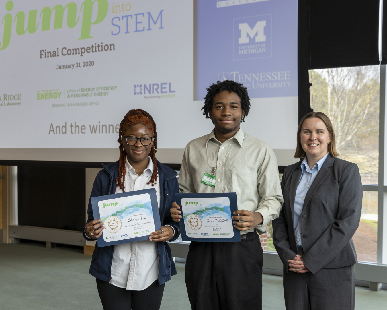 The winning team from Clark Atlanta University (From Left: Destiny Currie and James Whitfield) stand with JUMP into STEM Director Mary Hubbard.