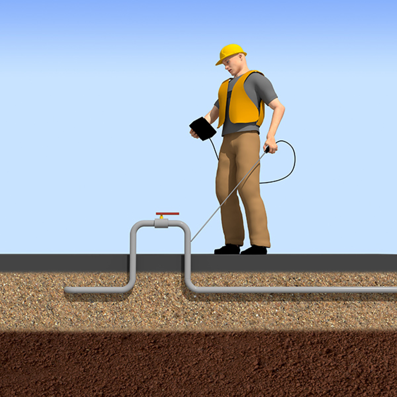Worker looking at a box and stick pointing at a ground pipe.