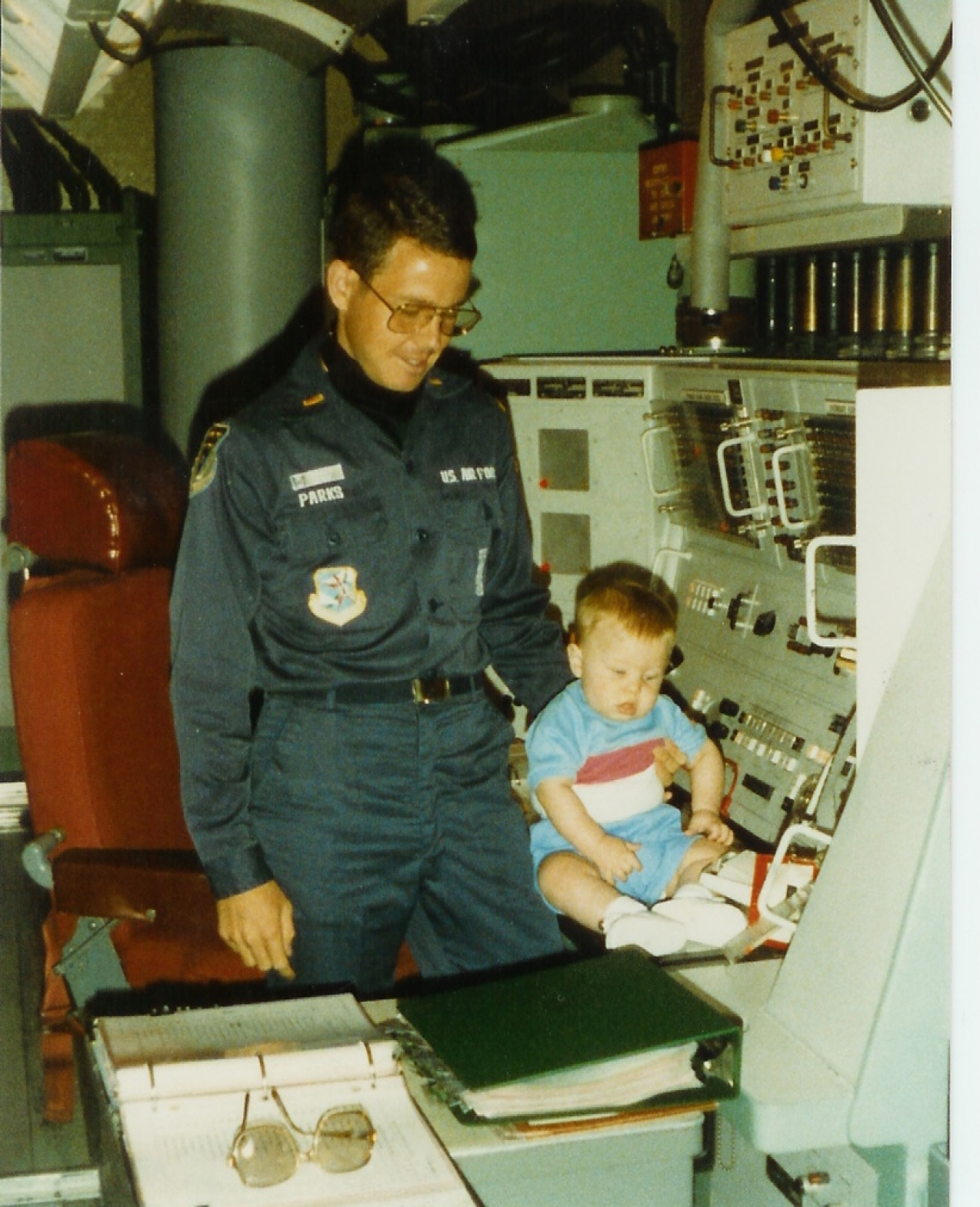 Doc Parks and his son, Brian Parks (today MSgt Brian Parks, USAF) taken at Grand Forks Air Force Base, North Dakota, in 1985 in an intercontinental ballistic missile launch control center simulator.