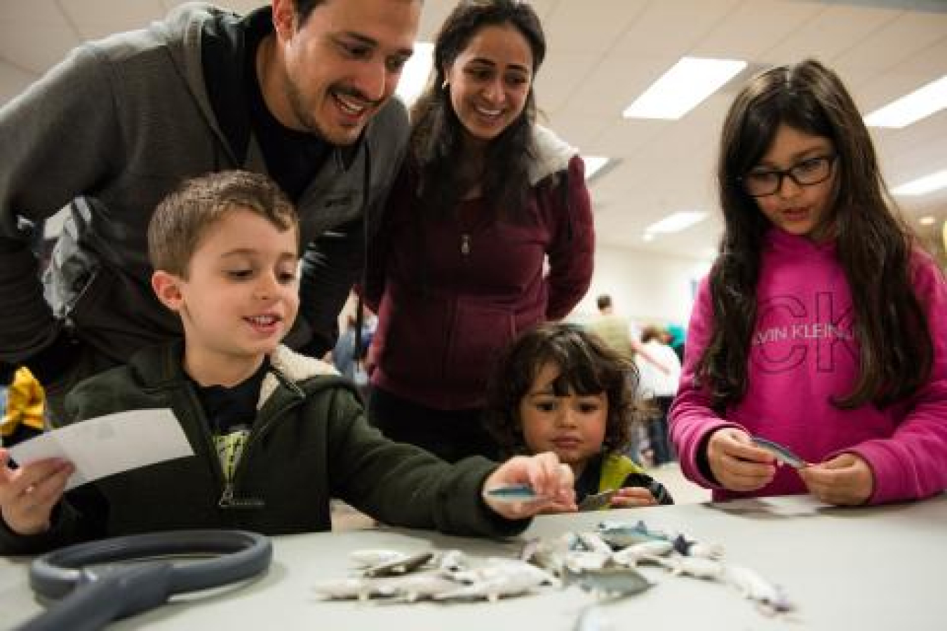 STEM Ambassadors are researchers who channel their enthusiasm for science to the general public, sharing science with the community via hands-on, interactive displays at events like this one at the Mid-Columbia Library.