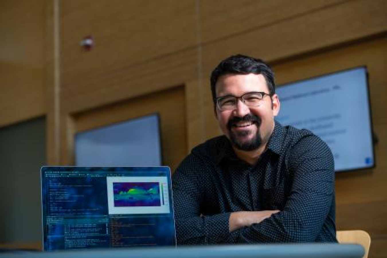 Sam Silva, a Linus Pauling fellow at PNNL, works on computational code related to atmospheric changes. One of his approaches is to use artificial intelligence to make predictions about future states of the atmosphere.