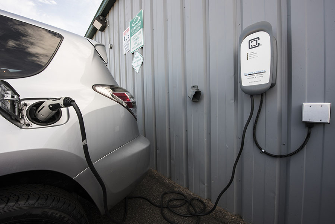 Electric vehicle plugged in. 