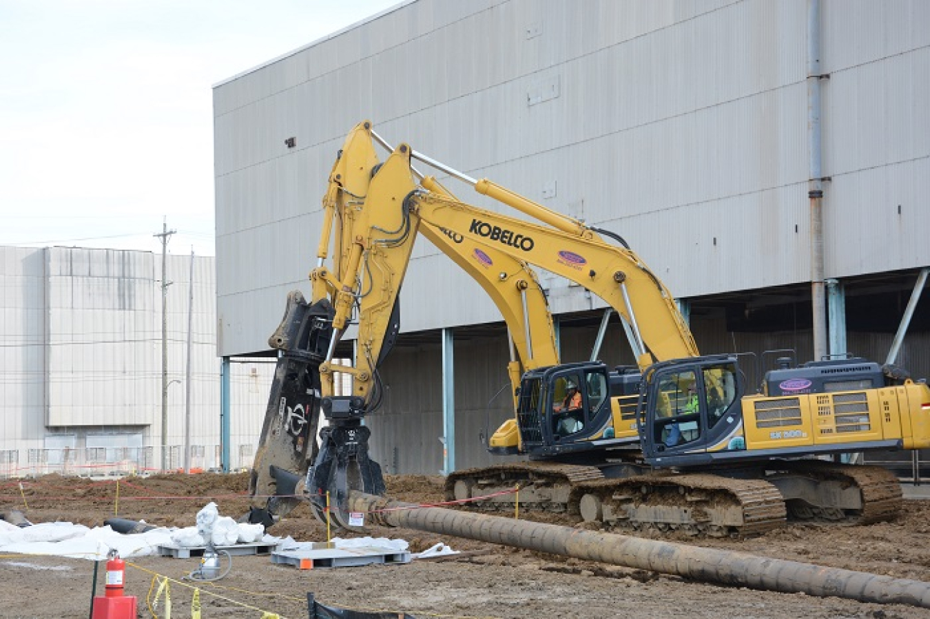 Removing high-pressure fire water lines from the perimeter of the X-326 Process Building at the Portsmouth Site