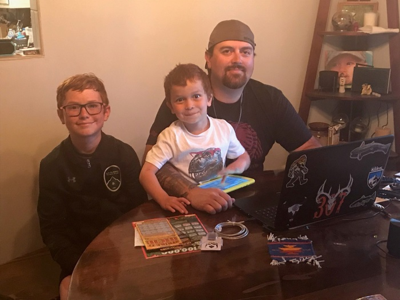 Frank Martinet and sons Ethan, 11, at left, and Blake, 4.