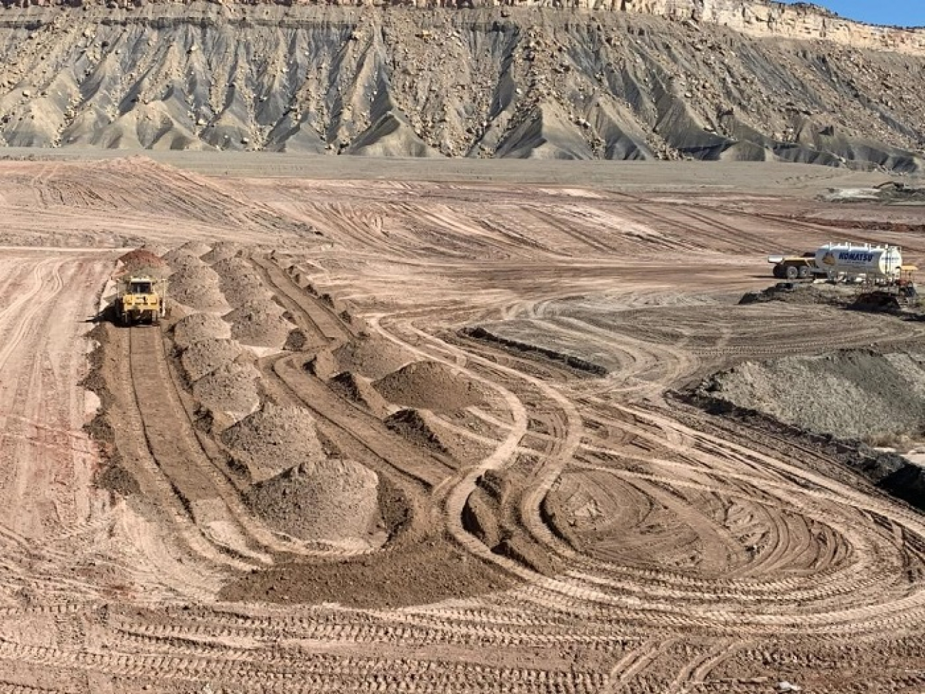 Crews place soil in the Moab Uranium Mill Tailings Remedial Action Project’s Crescent Junction disposal cell.