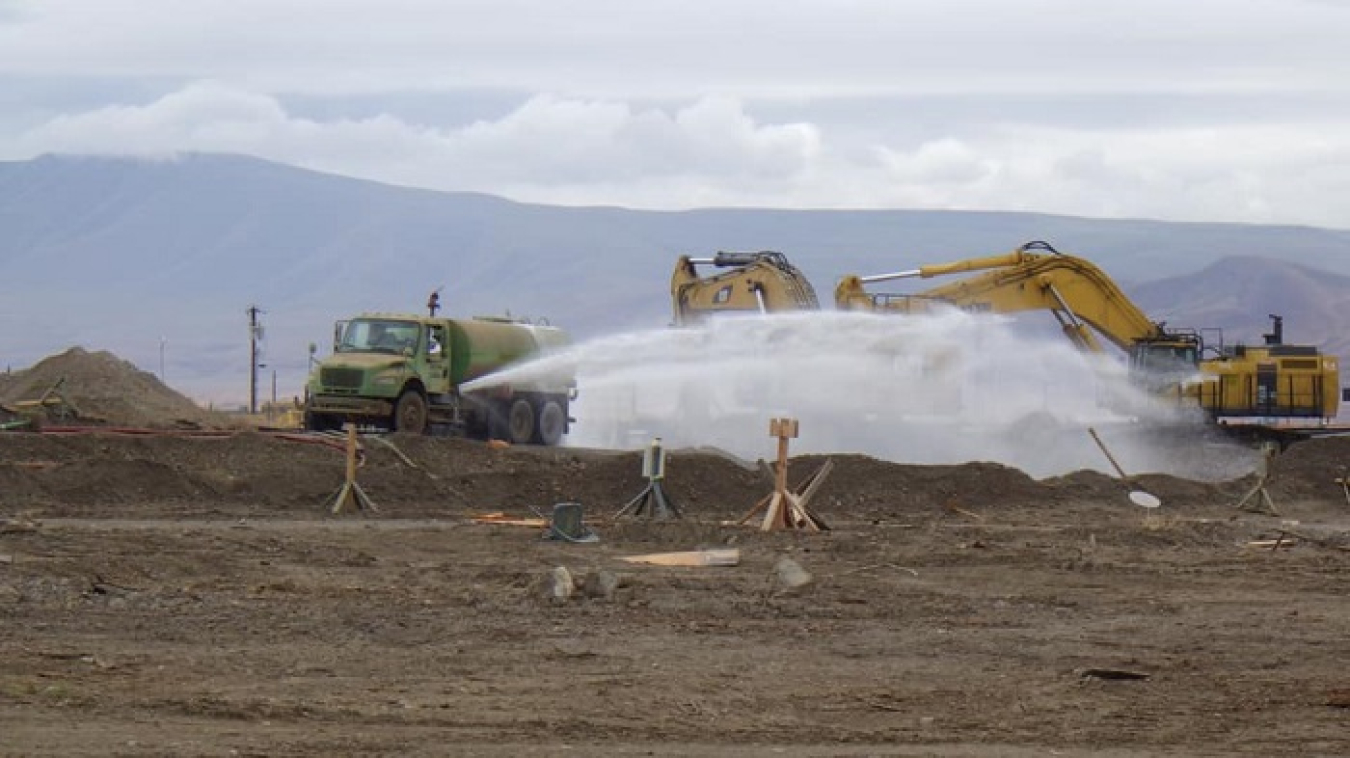 Workers applying a fixative at Hanford Richland site