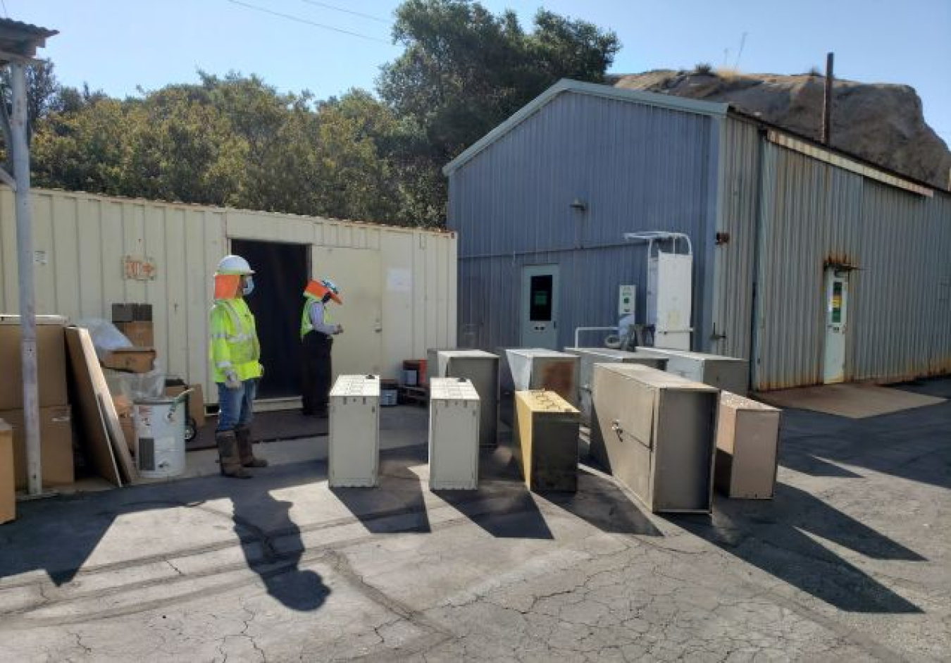 As part of the deactivation process, workers from DOE contractor North Wind gather furnishings taken from buildings in the Radioactive Materials Handling Complex that will be demolished later this summer at the Energy Technology Engineering Center.