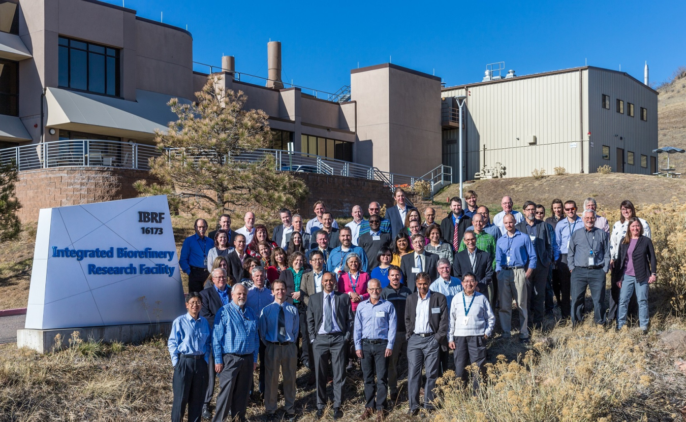 Group photo of people standing in an outdoor setting.