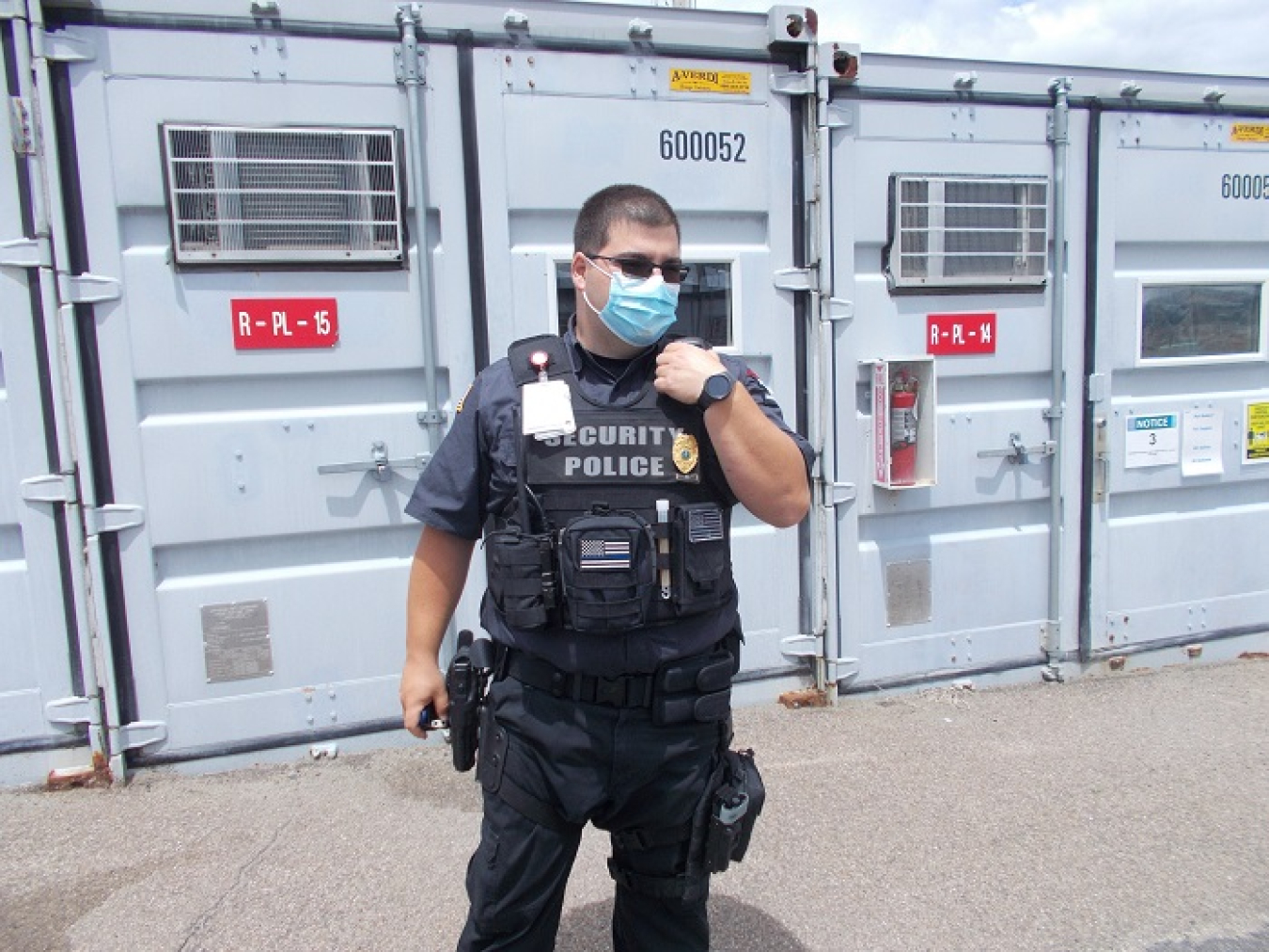 Security Police Officer Garrey with Securitas Critical Infrastructure Services, a contractor to EM’s West Valley Demonstration Project (WVDP), uses one of the site’s new radios to talk with other officers at WVDP.