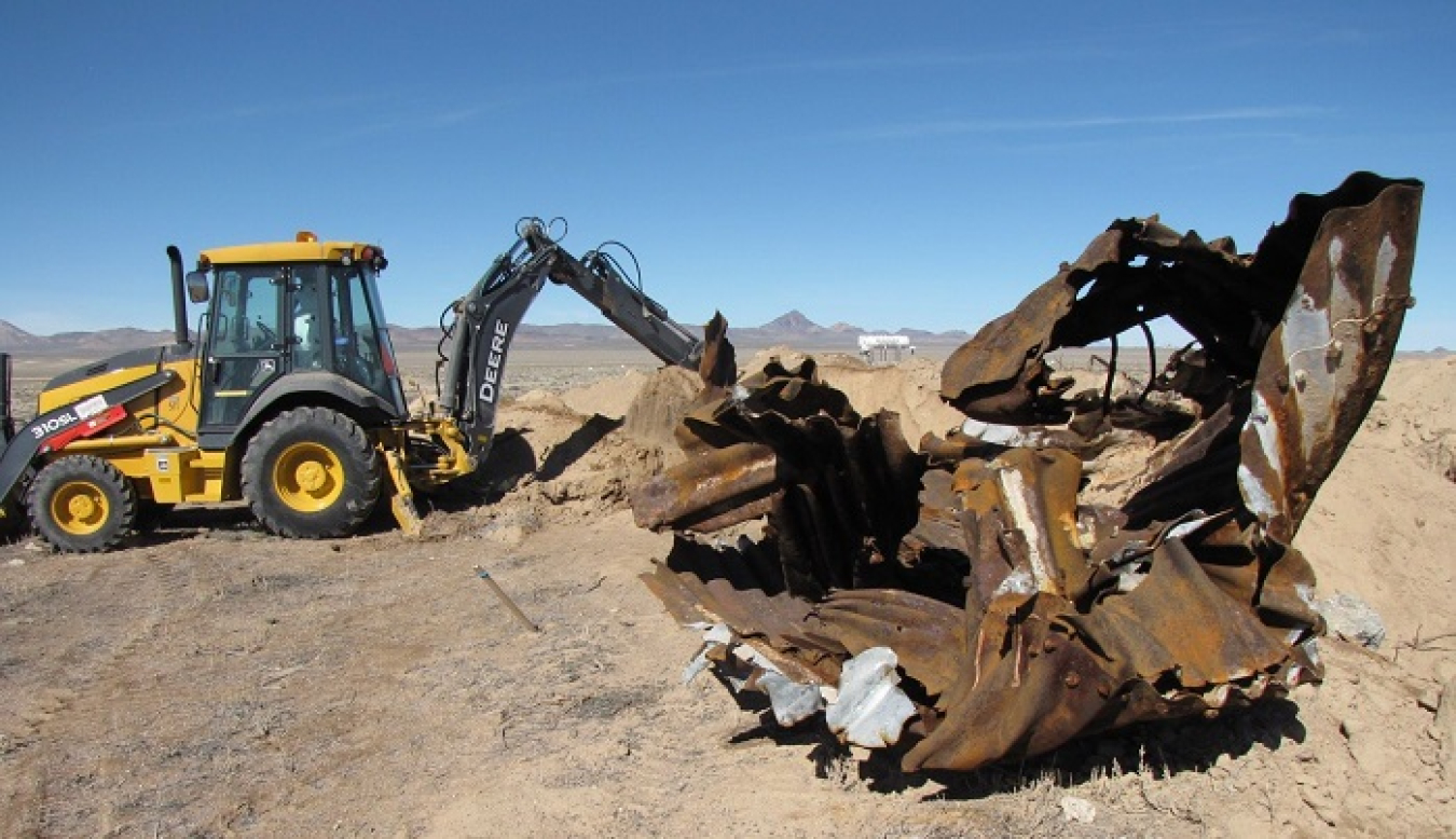 Navarro Research and Engineering, Inc. performed environmental corrective actions at the Clean Slate III site in July 2019 that included removing contaminated soil and debris for packaging and disposal at the Nevada National Security Site.