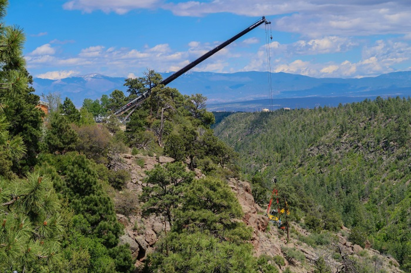 Cleanup locations at Los Alamos National Laboratory, a Manhattan Project site, include hillsides, canyon sides, and canyon bottoms. This photo shows soil cleanup in Los Alamos Canyon, which is adjacent to the former Technical Area-01.