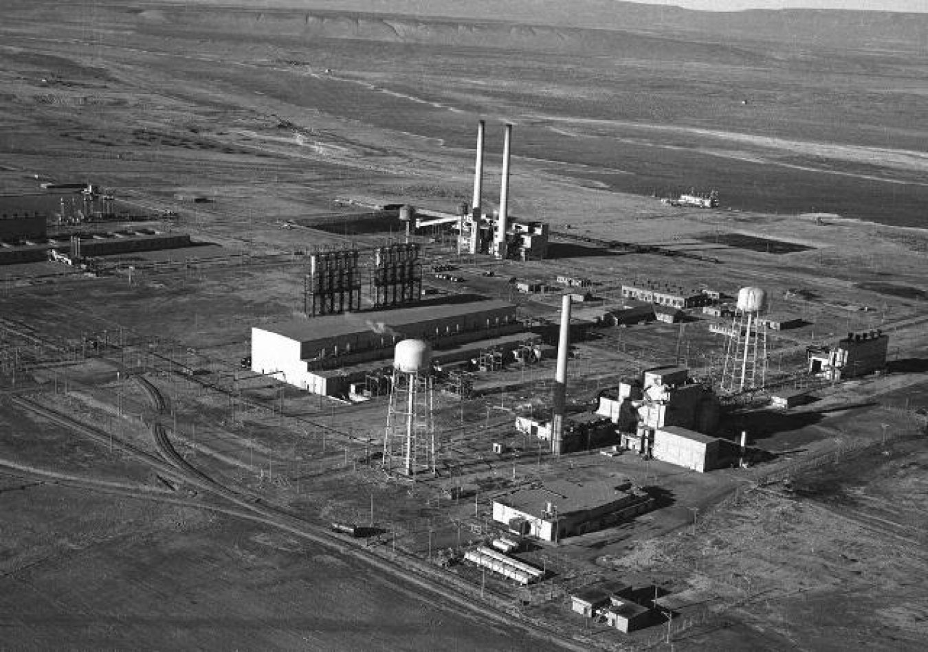 In this photo from World War II, Hanford's B Reactor can be seen between the water towers at right, along with other facilities that supported reactor operations. The reactor began operating in September 1944 and was shut down from 1946-1948. It then went