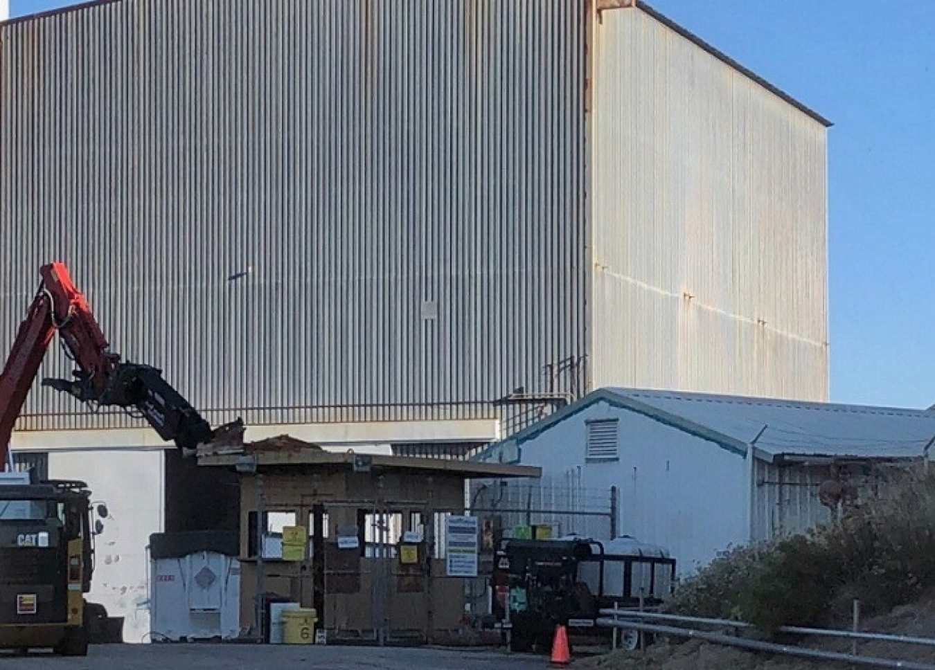 Workers have begun demolition at the Radioactive Materials Handling Facility complex at the Energy Technology Engineering Center.