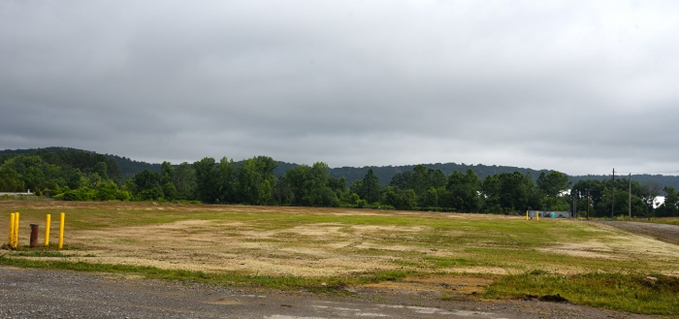 A view of the former K-832 Basin area after workers removed the basin and backfilled and seeded the site.
