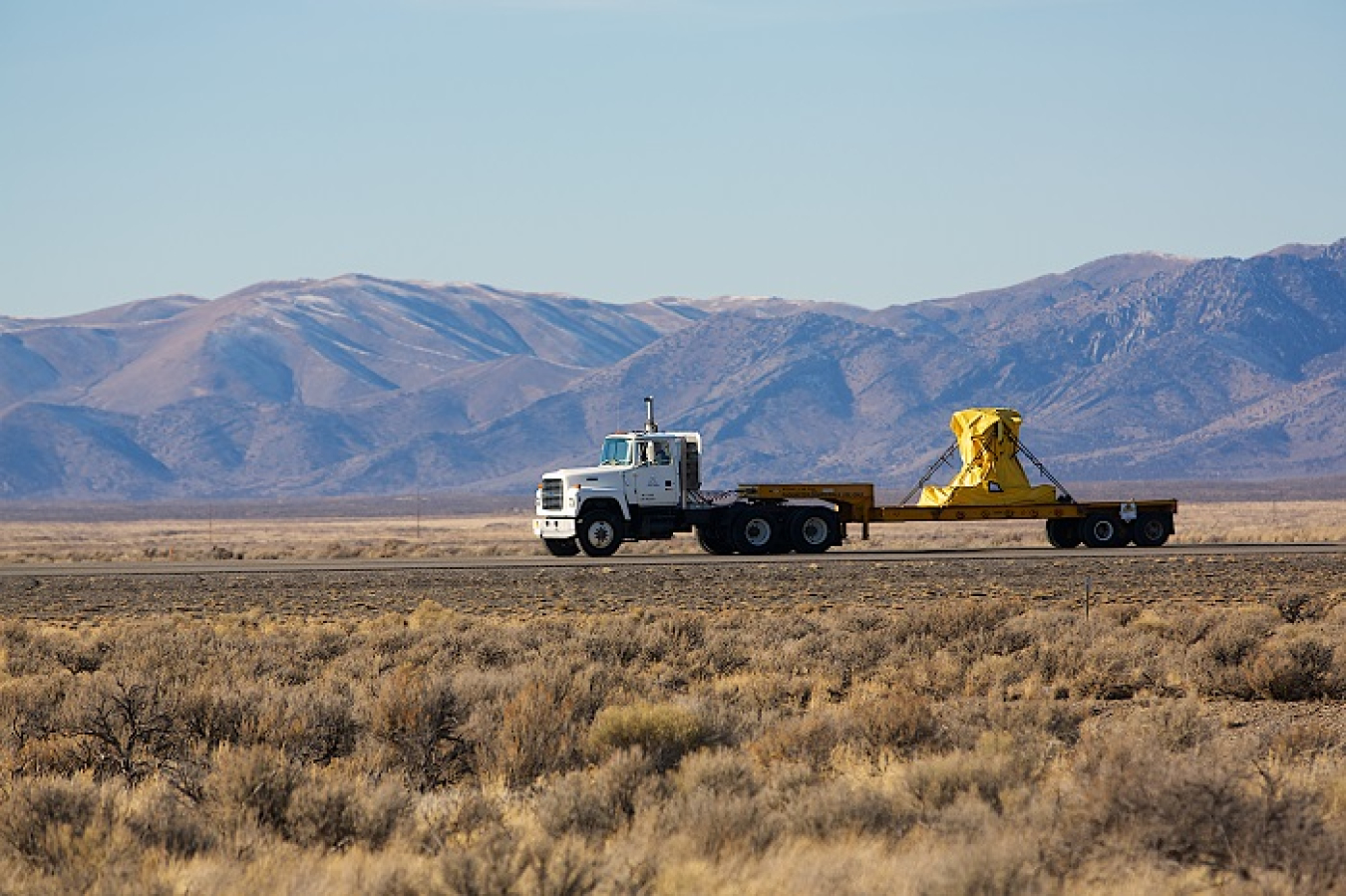 A shipment of spent nuclear fuel travels from the Advanced Test Reactor Complex to the Idaho Nuclear Technology and Engineering Center.