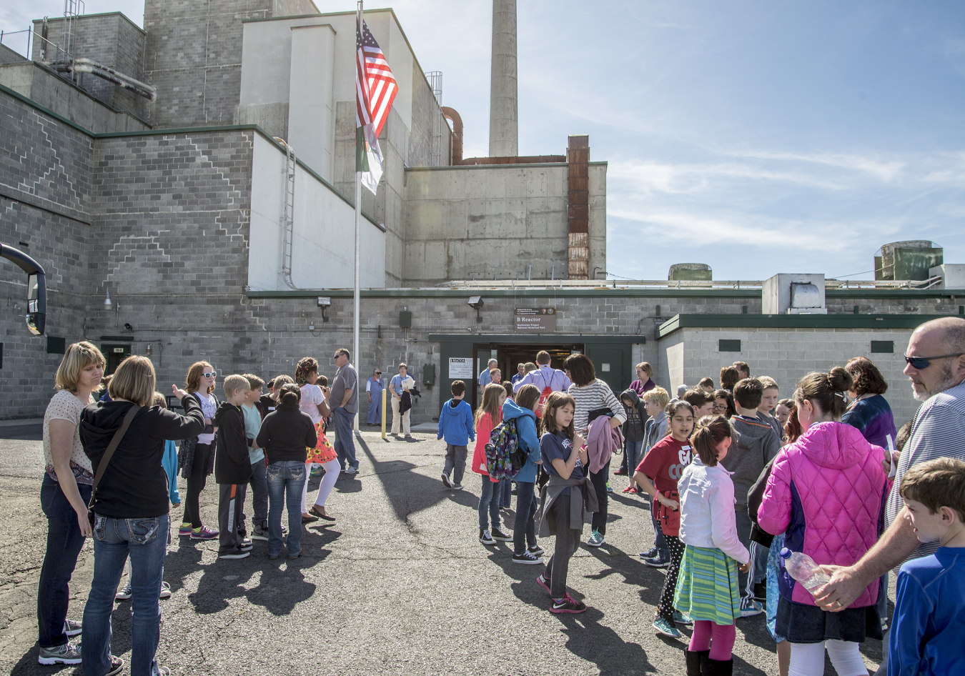 Students arrive at B Reactor for a tour. The Department of Energy works with elementary, middle, and high schools around the region to highlight B Reactor’s role in ushering in the atomic age, and the importance of STEM education.