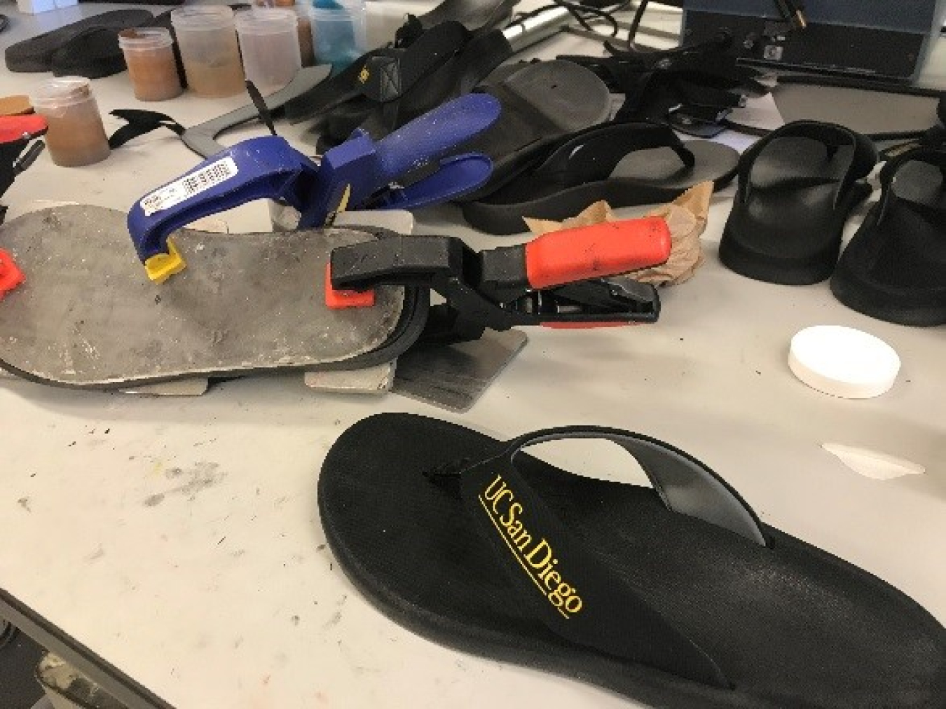 A flip flop on a work bench