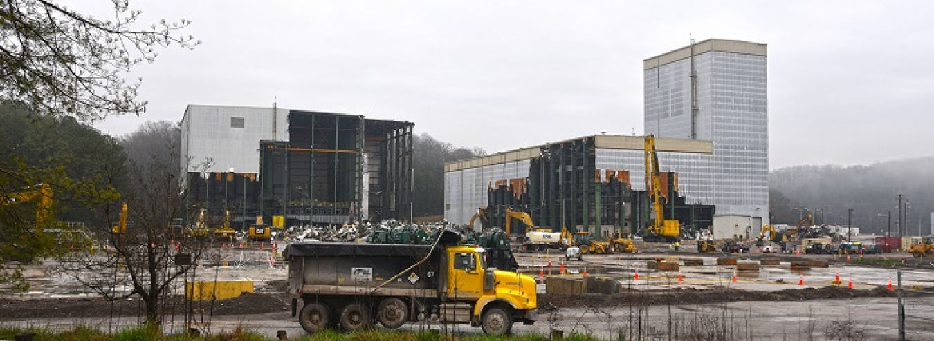 Demolition of the Centrifuge Complex at Oak Ridge presented challenges due to the size and height of its structures. Some buildings stood 180 feet tall.