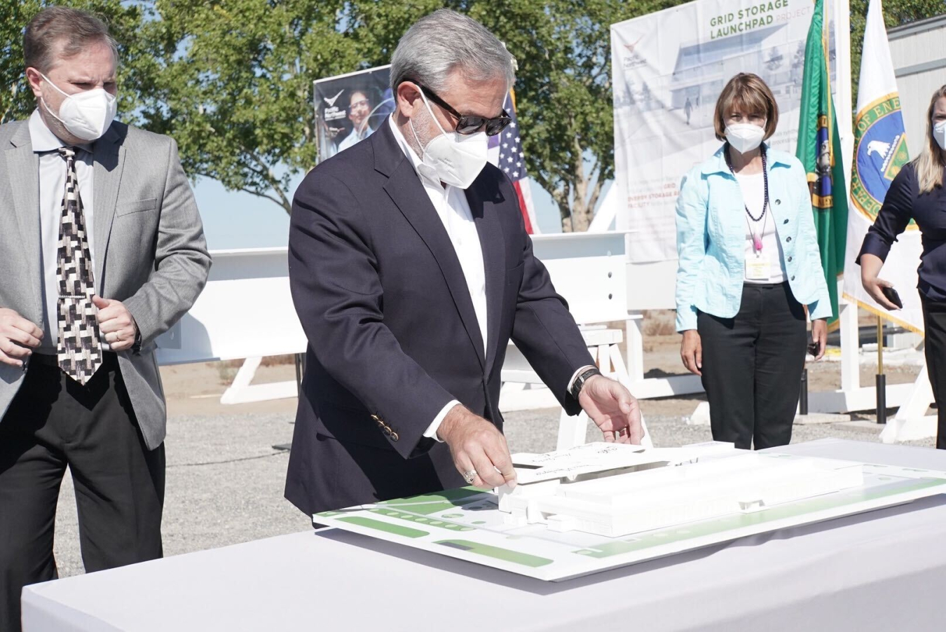 Secretary Brouillette looks at PNNL building model.