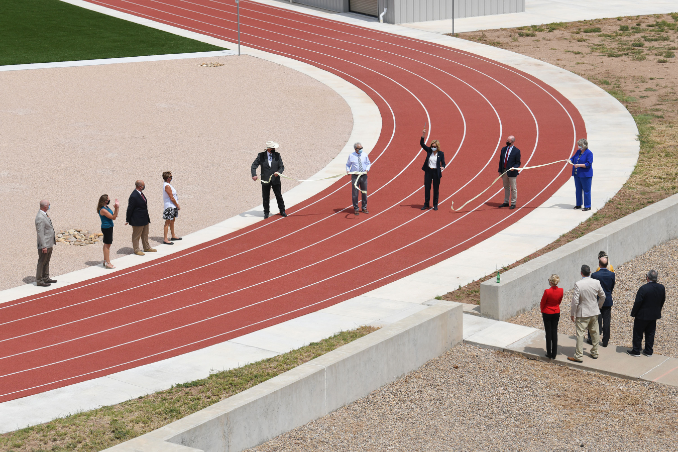 To cap off the trip, NNSA Administrator Lisa E. Gordon-Hagerty and U.S. Rep. William "Mac" Thornberry cut the ribbon to officially open the Office of Secure Transportation's new athletic track at the Pantex Plant.