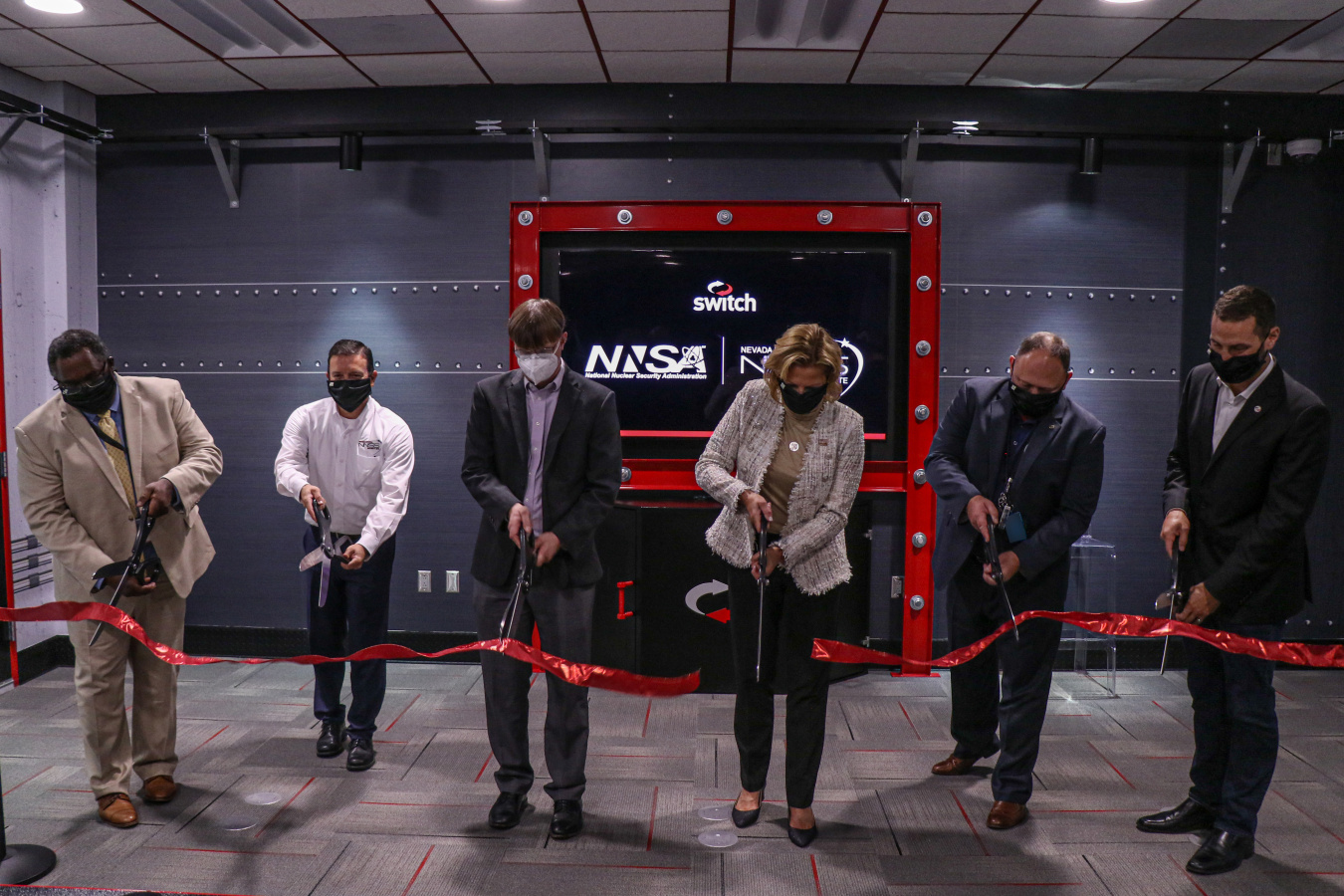 NNSA Administrator Lisa E. Gordon-Hagerty, joined by officials from NNSA's Office of Information Management, Switch, and the Nevada Field Office, open the new Emergency Communications Network in Las Vegas.
