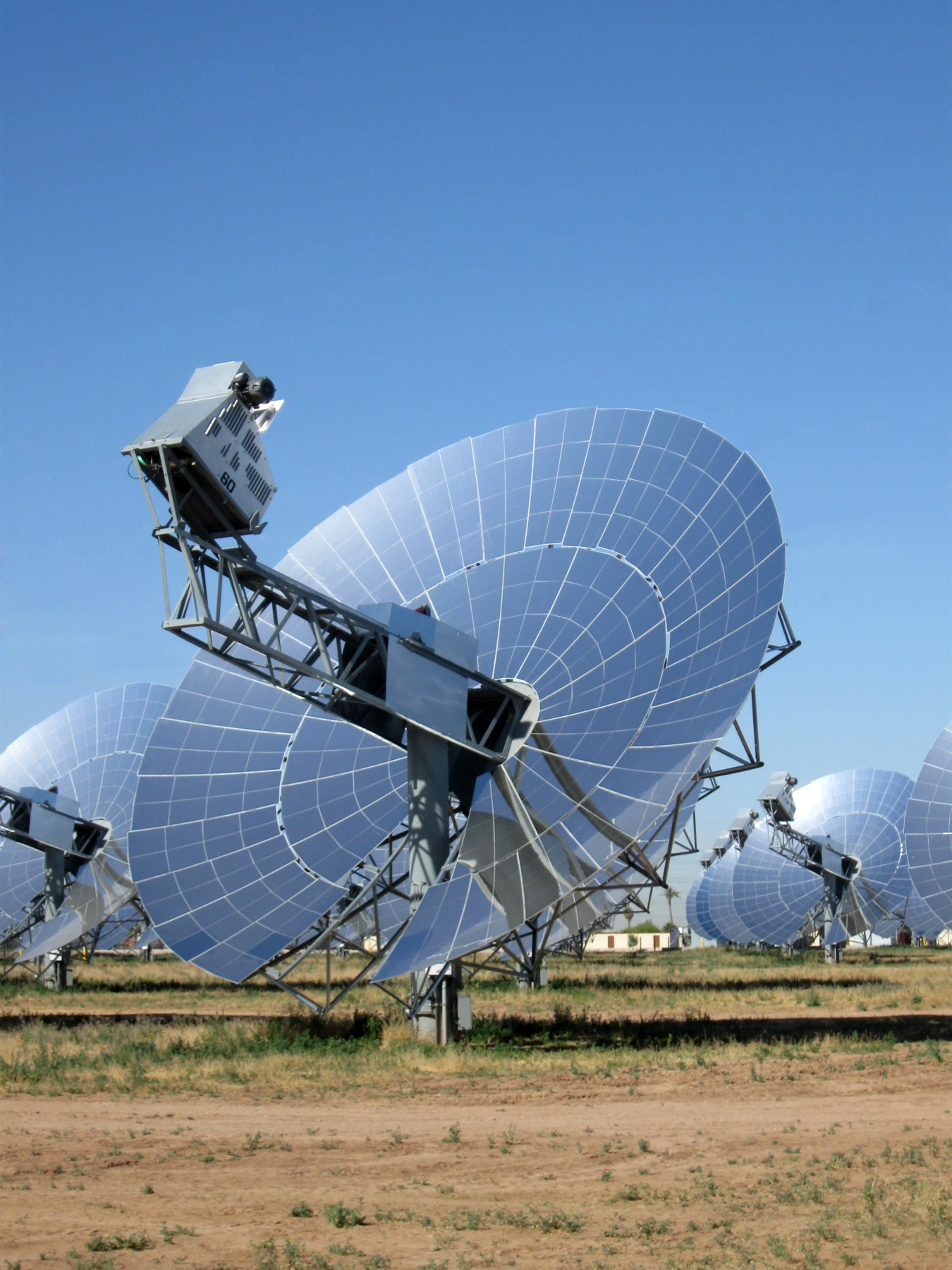 solar power system that uses a 38-foot mirrored parabolic dish combined with an automatic tracking system to collect and focus the sun's energy onto a Stirling engine to convert the solar thermal energy into grid quality electricity