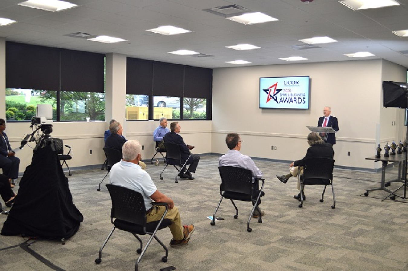Tim Melberg, UCOR’s manager of supply chain management, speaks at the company’s eighth annual Small Business Awards Program. The event recognized top performers whose exceptional performance contributed to cleanup accomplishments.