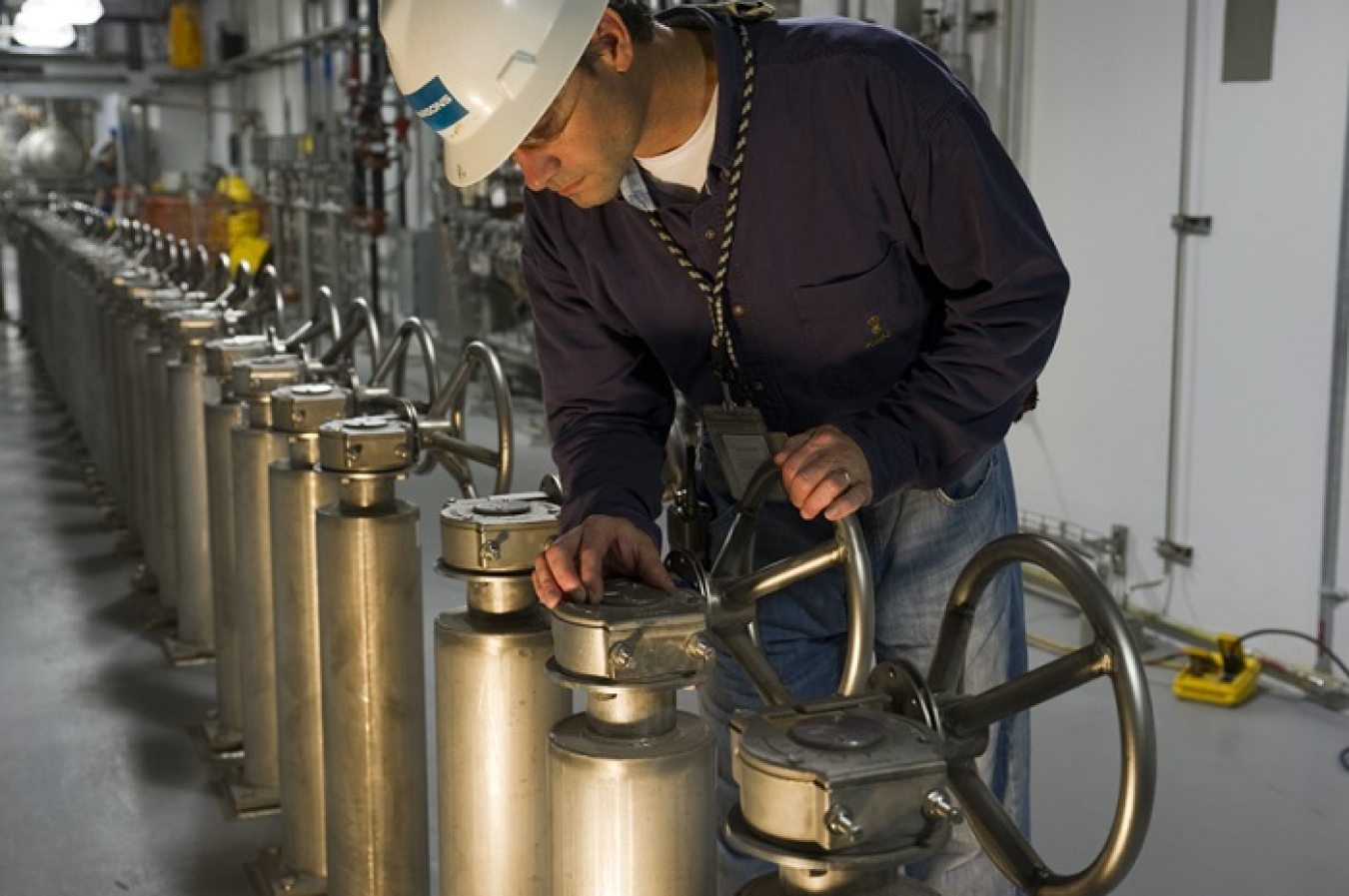 An employee works on the CSSX tank cell operating deck at the Salt Waste Processing Facility.