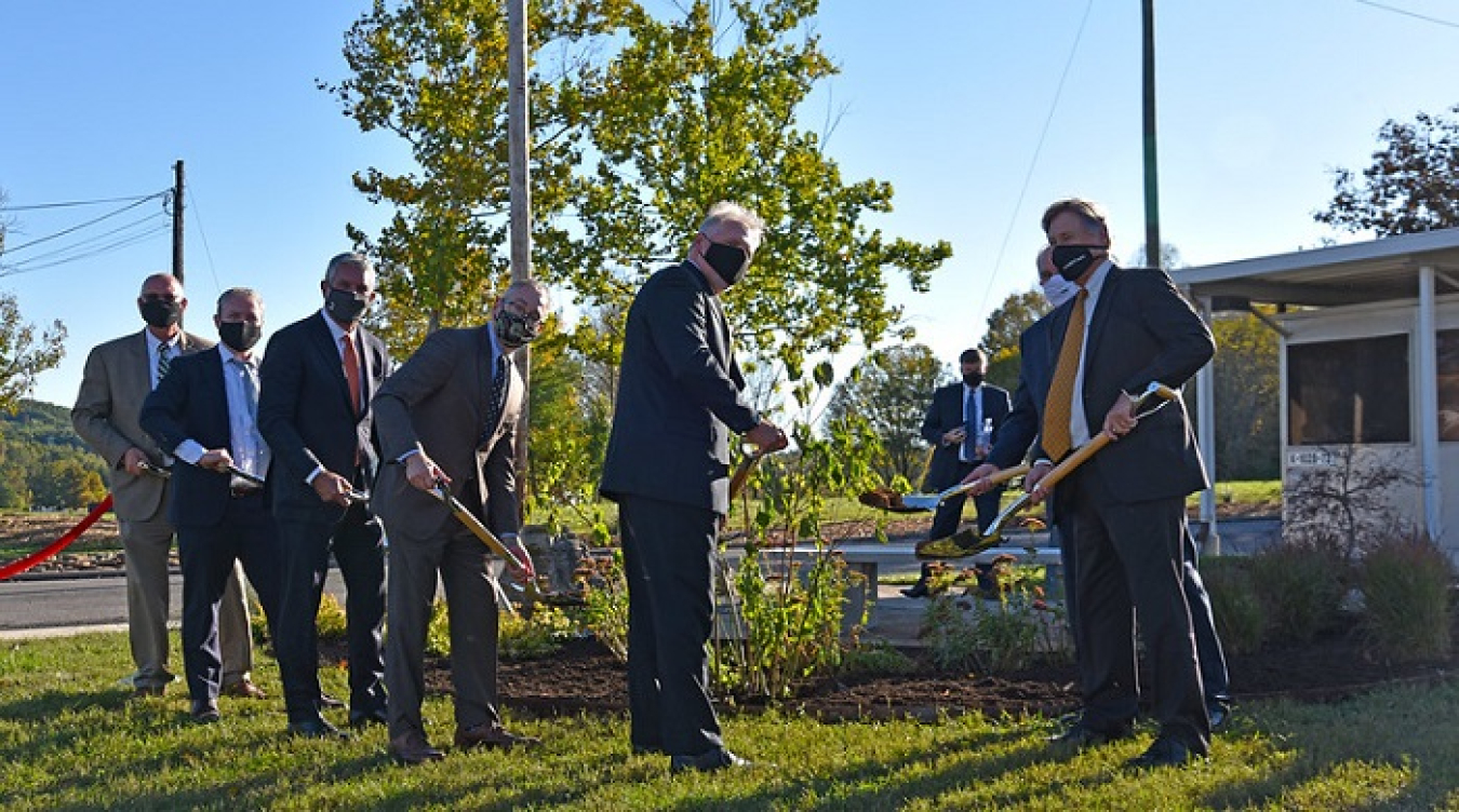 Following the event celebrating the achievement of Vision 2020 at Oak Ridge, attendees gathered for a tree planting and dedicated a small park named Crossroads Common at the East Tennessee Technology Park.