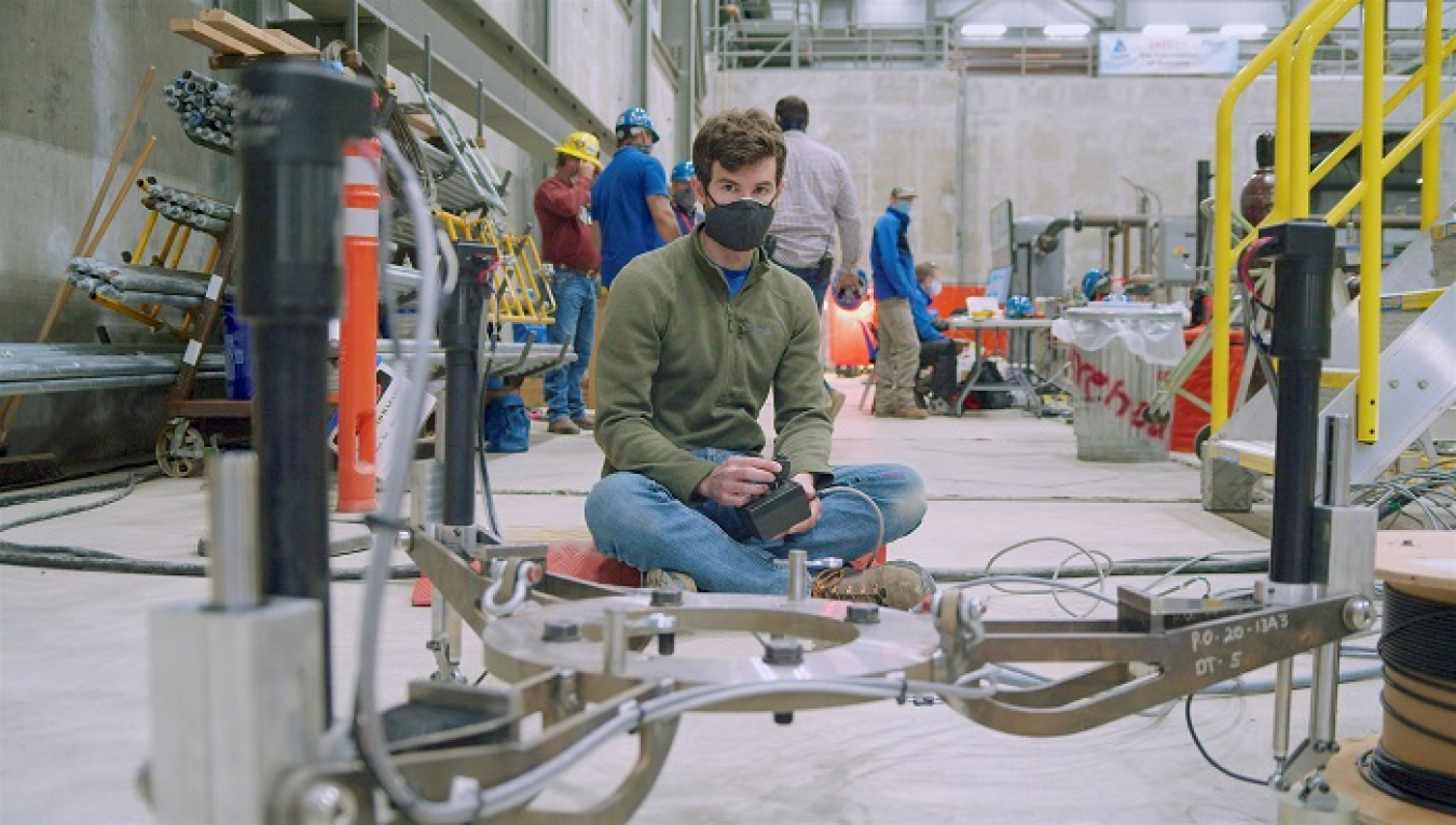 Chris Graham, calcine retrieval project lead design engineer for EM contractor Fluor Idaho, operates a riser positioning tool with a joy stick at the Idaho National Laboratory Site.