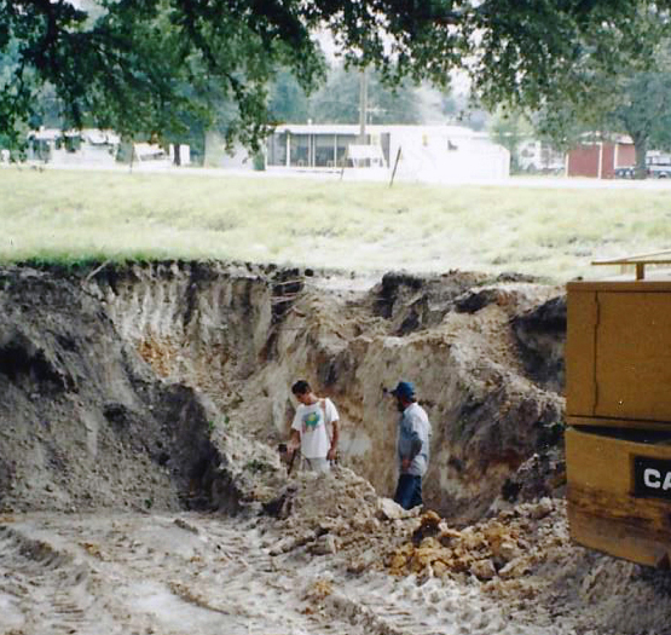 Surovchak performs environmental field work with a coworker in Florida in the late 1980s.