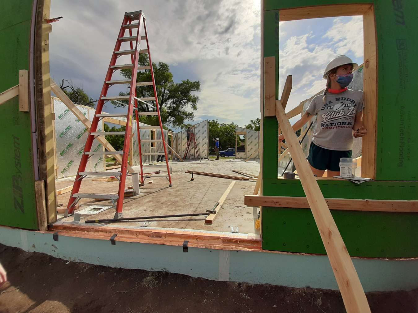 Kansas State University students return to work on building their solar house during the U.S. Department of Energy Solar Decathlon Build Challenge.