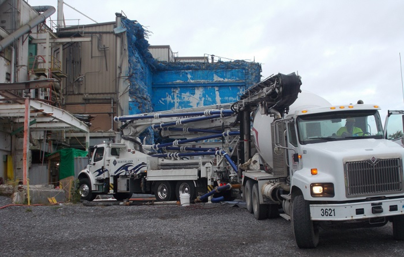 One of 44 trucks delivers grout to the West Valley Demonstration Project to place inside a cell 30 feet below ground.