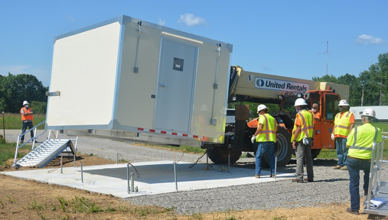 The first new air monitoring station is delivered to its installation location on Hewes Road at the Portsmouth Site.