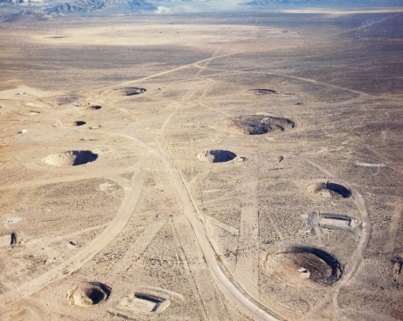 Aerial images of craters in Yucca Flat including Sedan Crater, located at the north end of Yucca Flat.