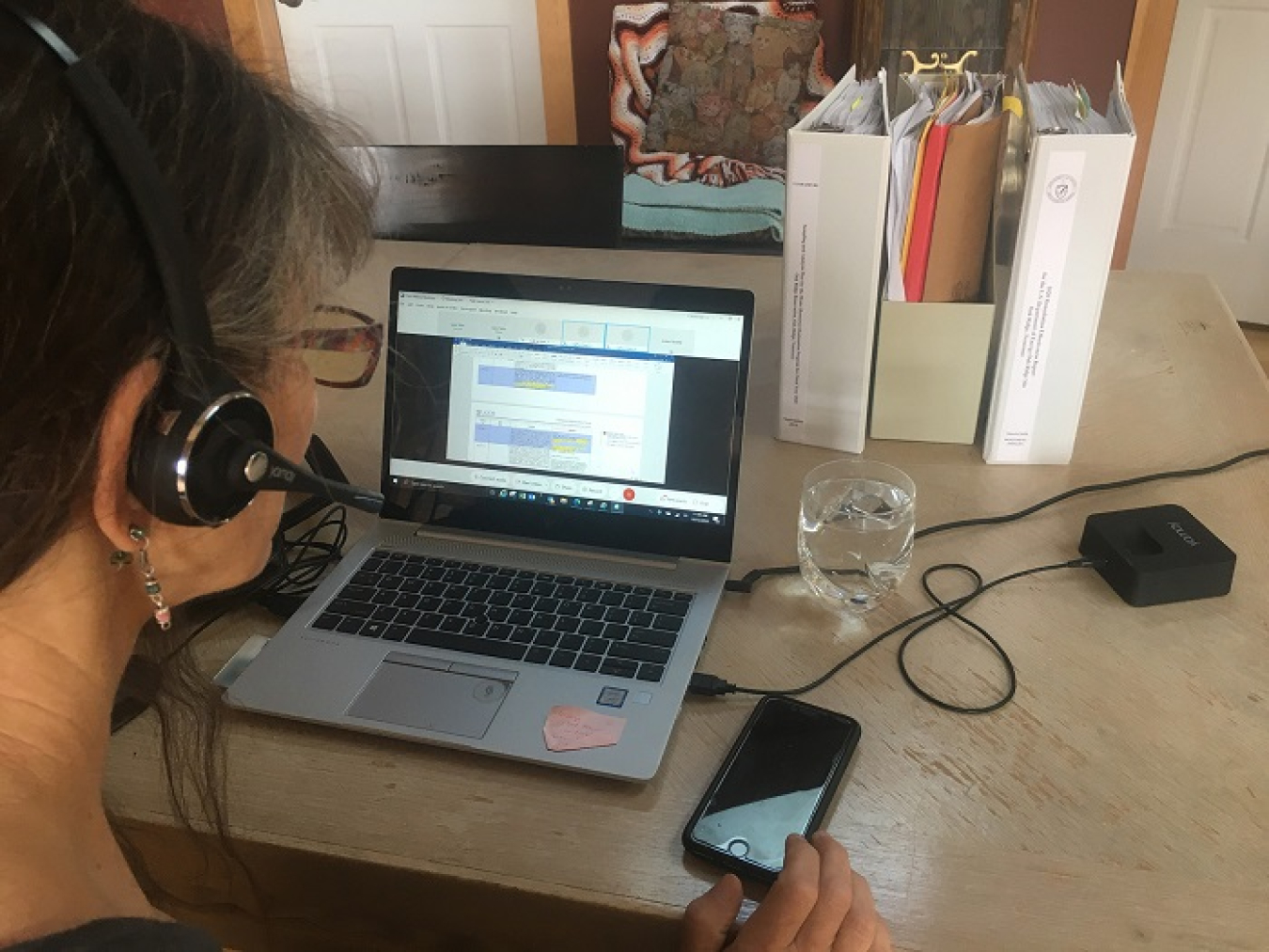 Lynn Sims, the manager of the five-year review, looks at data that will help evaluate Oak Ridge’s remediation measures. Sims is an employee of UCOR subcontractor RSI, which performs water and soil sampling at the site, among other things.