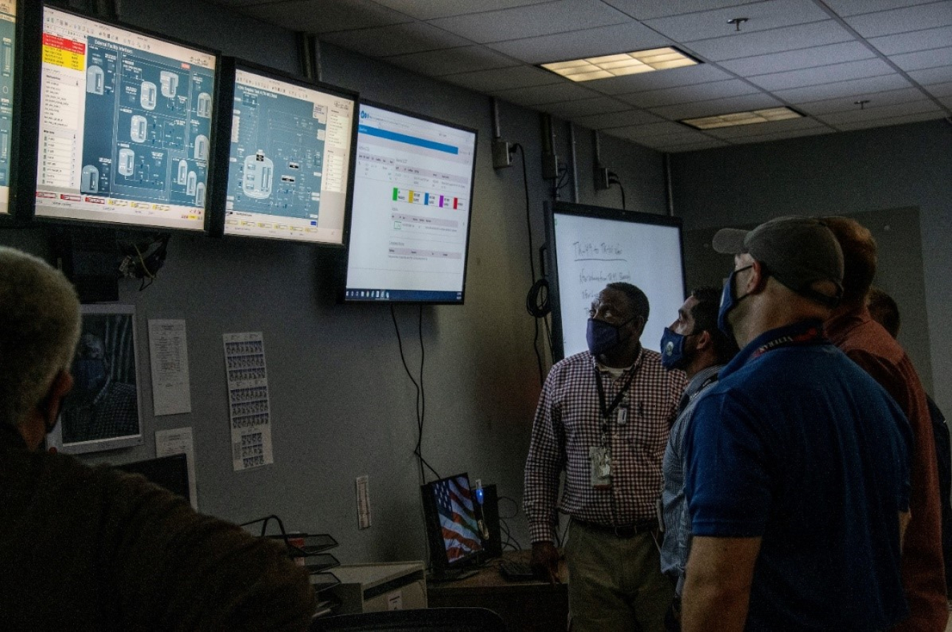 Employees at SRS monitor the first transfer of waste to the SWPF