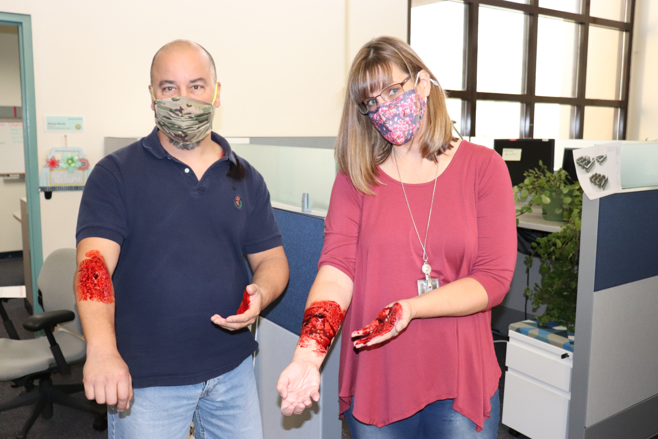 NNSA employees Loren Torres and Cheri Ashe got the full moulage treatment from members of Kirtland Air Force Base's exercise team. The employees were just two of the “victims” in the active shooter exercise.