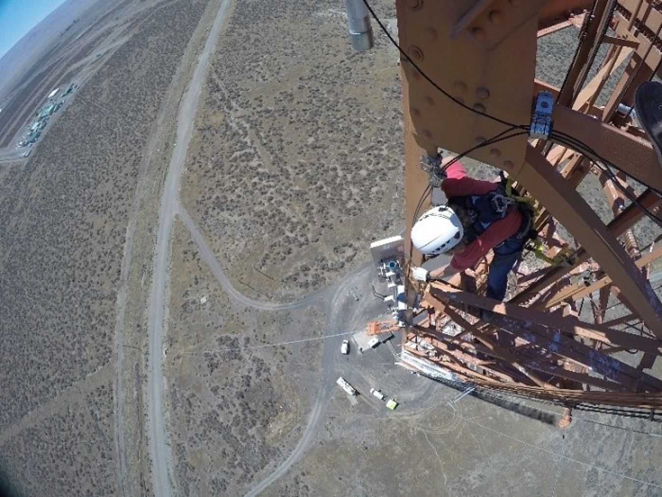 Bryan Hurt, with Mission Support Alliance’s radio maintenance organization, works on cables for critical communications systems located 365 feet up the 400-foot Hanford Meteorological Station tower.