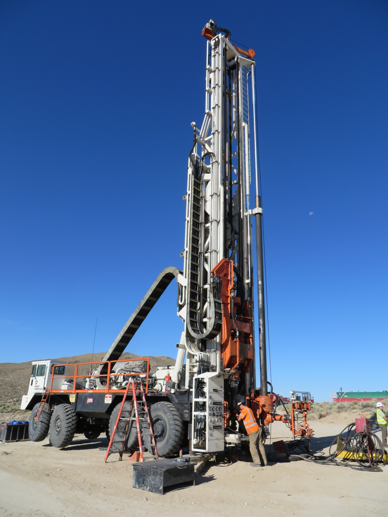 A drill rig was used to install monitoring wells in 2014. The wells were completed at depths ranging from 1,570 to 1,750 feet.