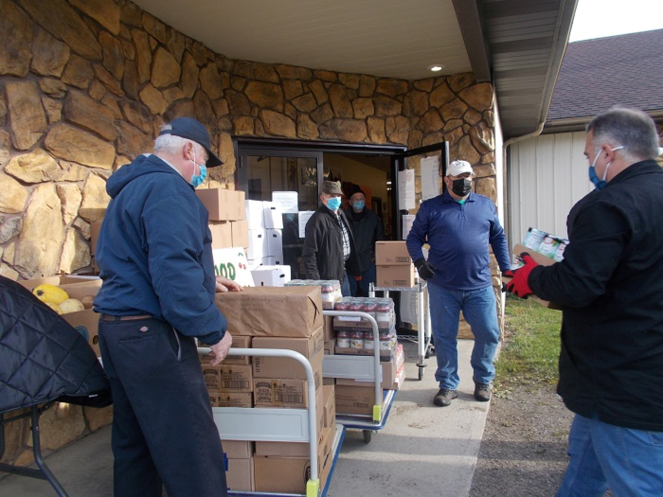 West Valley Demonstration Project employees deliver donated food to the Little Valley Baptist Church food pantry in Little Valley, New York.