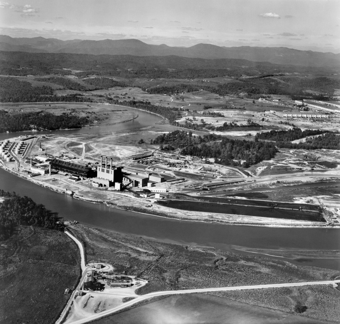 A 1949 photo shows the former K-770 Powerhouse and oil tank farm.